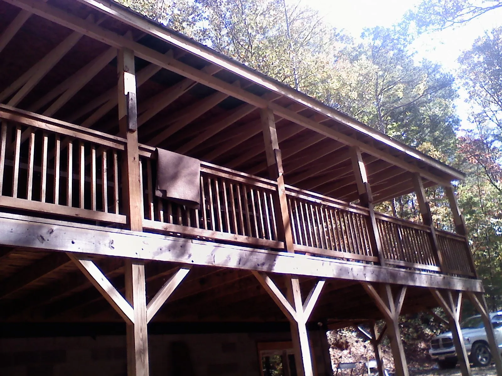 Timber framing under a new elevated porch and deck — Roof Leak Repair in Alcove by Roofing Brothers